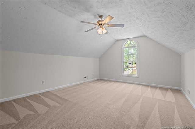 481 Clearwater Harbour, Sanford, NC 27332 - additional living space featuring a textured ceiling, baseboards, carpet flooring, lofted ceiling, and ceiling fan