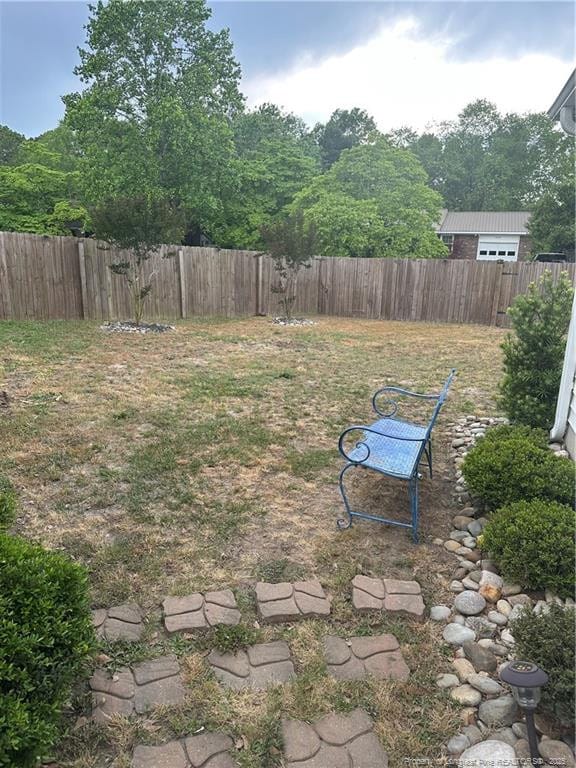 view of yard with fence