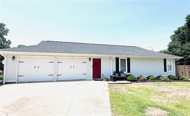 5706 Archer Rd, Hope Mills, NC 28348 - ranch-style house with an attached garage, concrete driveway, and covered porch