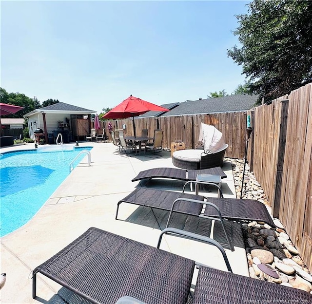 5706 Archer Rd, Hope Mills, NC 28348 - view of swimming pool with a fenced backyard, a patio area, and outdoor dining space