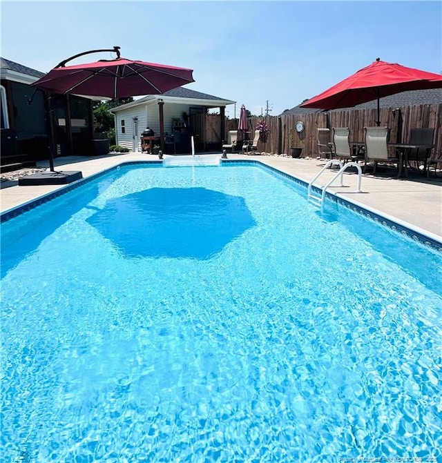 5706 Archer Rd, Hope Mills, NC 28348 - view of swimming pool featuring a patio