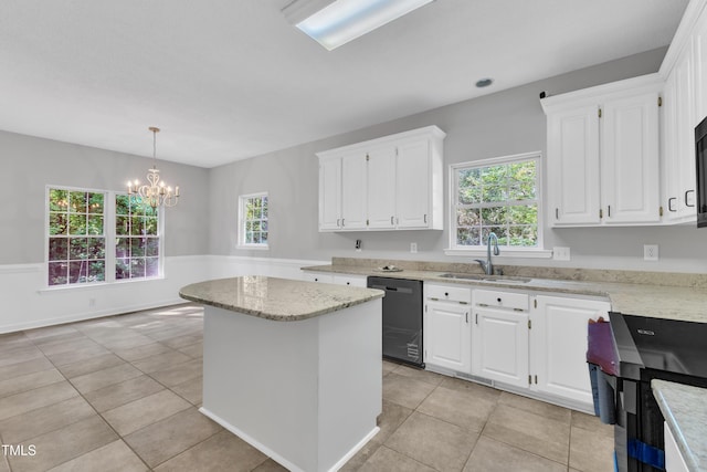 kitchen with a kitchen island, dishwasher, a sink, white cabinets, and an inviting chandelier