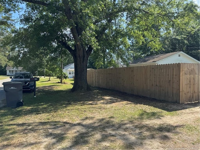 view of yard with fence