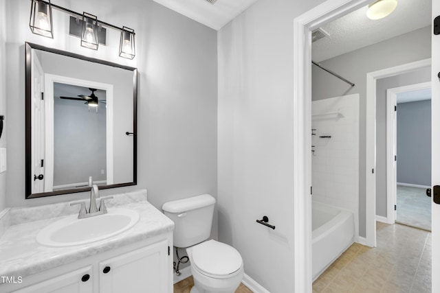 6513 Hearthstone Dr, Raleigh, NC 27615 - full bathroom with toilet, shower / washtub combination, ceiling fan, vanity, and baseboards