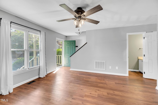 6513 Hearthstone Dr, Raleigh, NC 27615 - empty room featuring wood finished floors, baseboards, and a ceiling fan