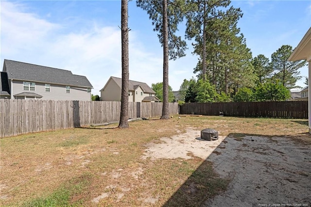 view of yard with a fenced backyard
