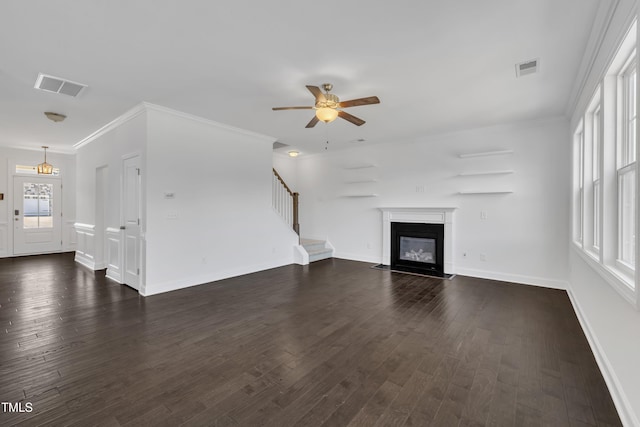 384 Grey Hawk Dr, Garner, NC 27529 - unfurnished living room featuring stairs, ceiling fan, dark wood finished floors, a fireplace with flush hearth, and baseboards