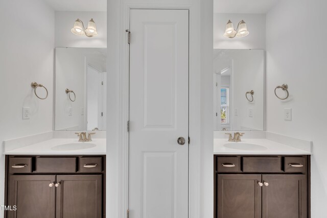 384 Grey Hawk Dr, Garner, NC 27529 - full bathroom featuring two vanities