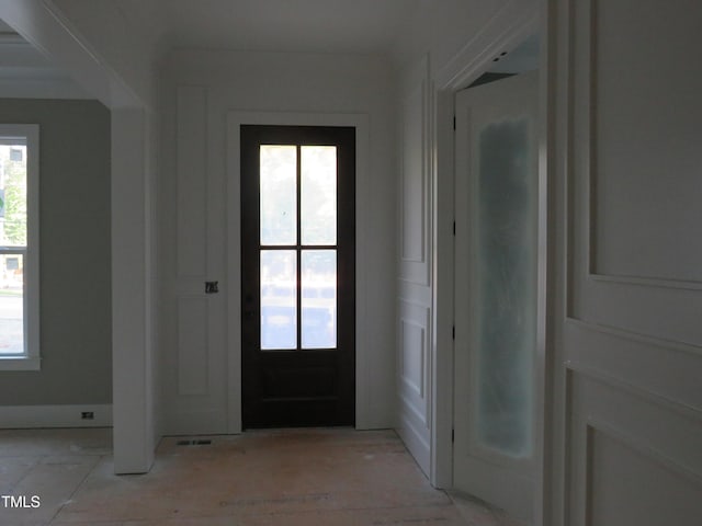 doorway to outside featuring plenty of natural light