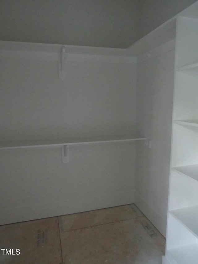 walk in closet featuring tile patterned floors