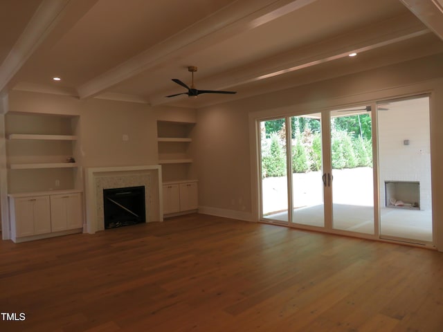 1444 Old Apex Rd, Cary, NC 27513 - unfurnished living room featuring a fireplace, beamed ceiling, wood finished floors, ceiling fan, and baseboards