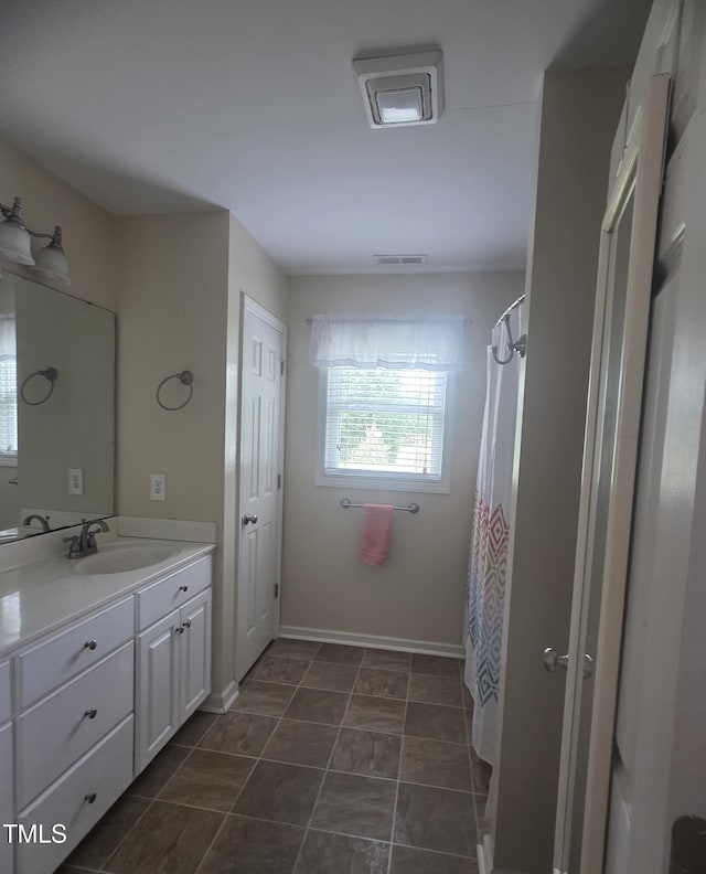66 Epsom Rocky Ford Rd, Henderson, NC 27537 - full bathroom with vanity, baseboards, and curtained shower