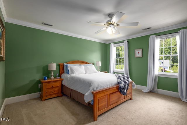 bedroom featuring multiple windows, light carpet, baseboards, ornamental molding, and ceiling fan