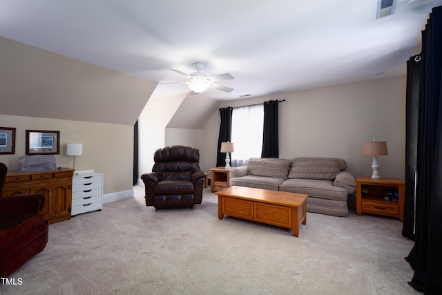 living area featuring light carpet, a ceiling fan, and lofted ceiling