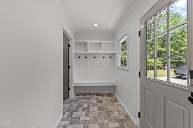 mudroom featuring light stone finish flooring, crown molding, baseboards, and recessed lighting