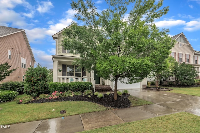 1920 Bright Kannon Way, Wendell, NC 27591 - obstructed view of property with covered porch, concrete driveway, and a front lawn