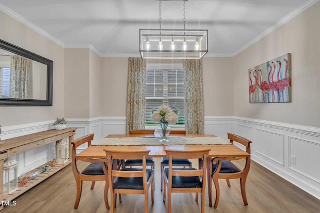 1920 Bright Kannon Way, Wendell, NC 27591 - dining area with wood finished floors, ornamental molding, and a wainscoted wall