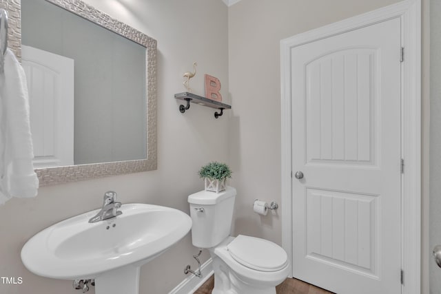 1920 Bright Kannon Way, Wendell, NC 27591 - bathroom featuring a sink, toilet, and baseboards