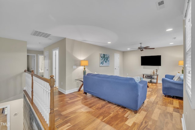 1920 Bright Kannon Way, Wendell, NC 27591 - living room featuring light wood-style floors, recessed lighting, a ceiling fan, and baseboards