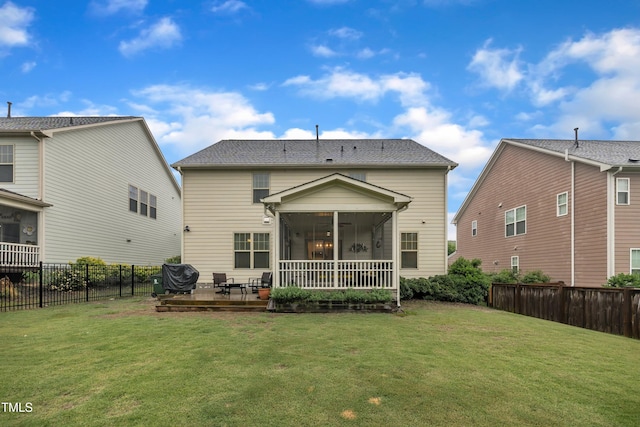 1920 Bright Kannon Way, Wendell, NC 27591 - back of house featuring a sunroom and a patio area