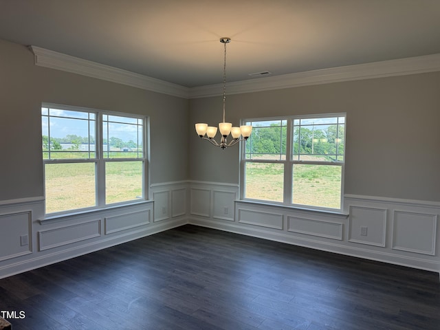 unfurnished room with wainscoting, ornamental molding, a notable chandelier, and visible vents