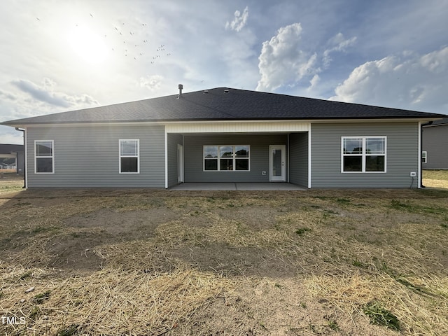back of property with a patio area