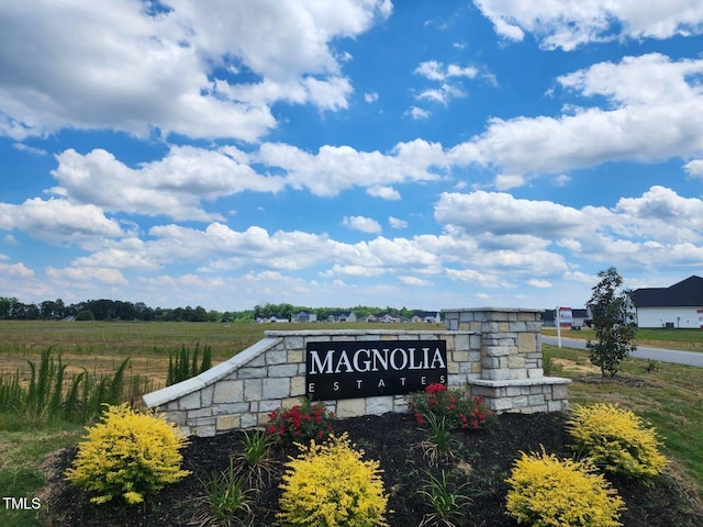 view of community sign