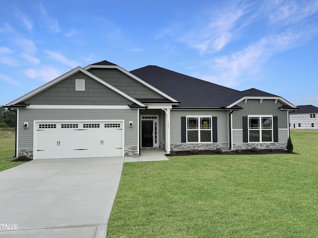5025 Trident Maple Ct Lot 15, Battleboro, NC 27809 - craftsman-style house featuring stone siding, concrete driveway, a garage, a front yard, and board and batten siding