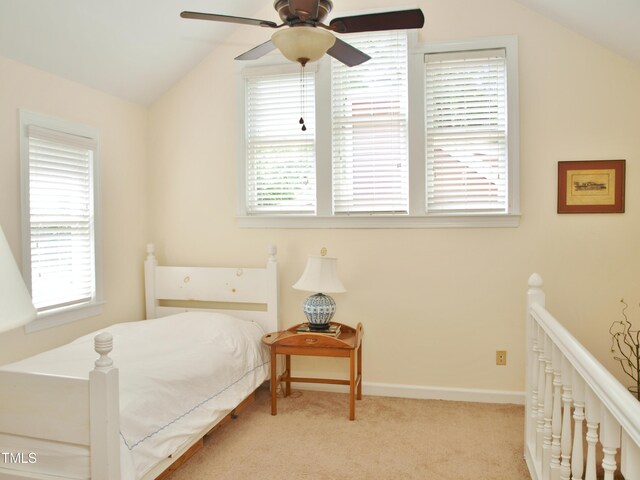 1707 Falls Church Rd, Raleigh, NC 27609 - bedroom featuring lofted ceiling, multiple windows, carpet floors, and baseboards