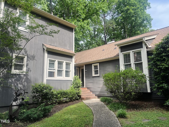 1707 Falls Church Rd, Raleigh, NC 27609 - view of front facade featuring a shingled roof