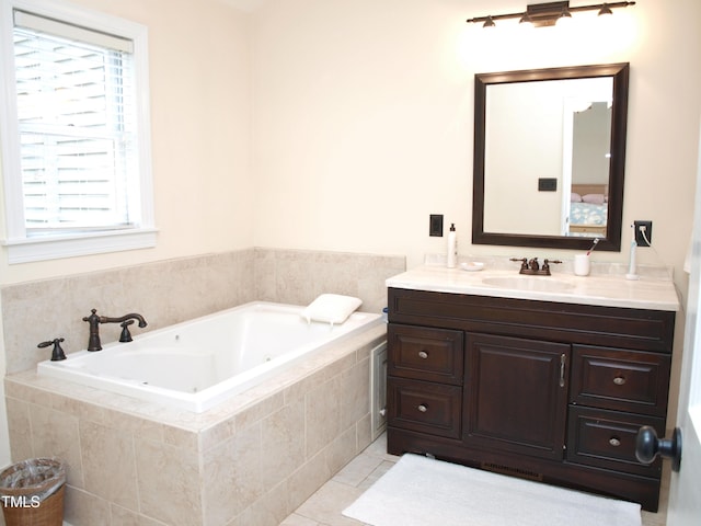 1707 Falls Church Rd, Raleigh, NC 27609 - full bath with a tub with jets, vanity, and tile patterned floors