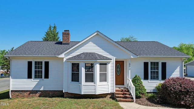 500 Lemontree Ct, Graham, NC 27253 - bungalow with roof with shingles, a chimney, and entry steps