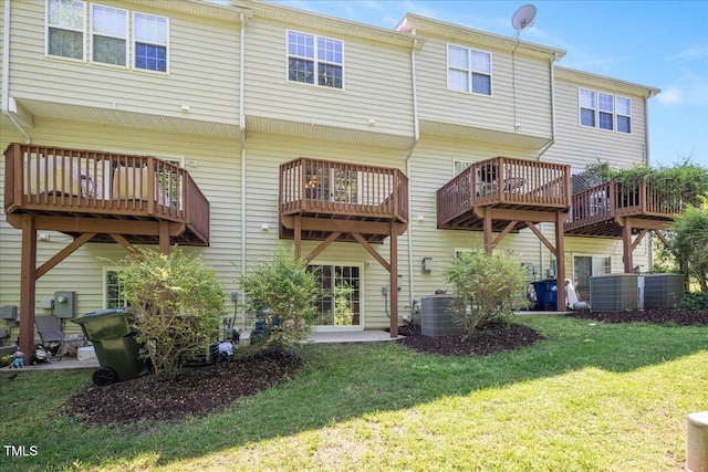 7616 Satinwing Ln, Raleigh, NC 27617 - rear view of property featuring central AC unit and a lawn