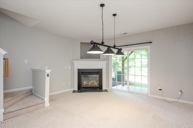 7616 Satinwing Ln, Raleigh, NC 27617 - unfurnished living room with carpet, baseboards, and a fireplace with flush hearth