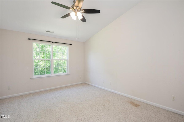 7616 Satinwing Ln, Raleigh, NC 27617 - carpeted spare room with baseboards, a ceiling fan, and lofted ceiling