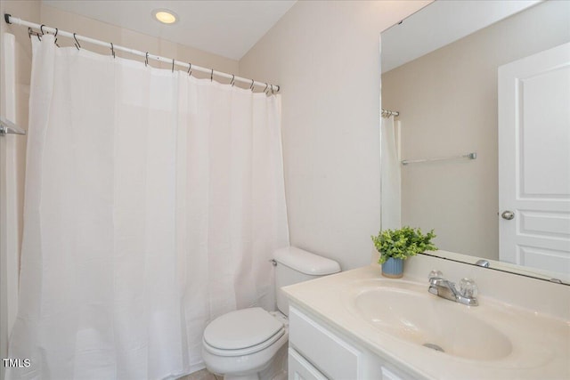 7616 Satinwing Ln, Raleigh, NC 27617 - full bathroom with toilet, vanity, and recessed lighting