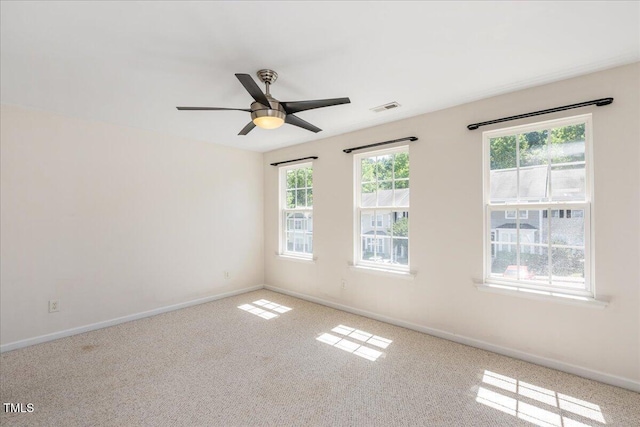 7616 Satinwing Ln, Raleigh, NC 27617 - carpeted empty room featuring ceiling fan and baseboards
