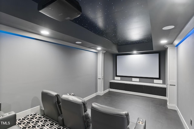 home theater room featuring baseboards and recessed lighting