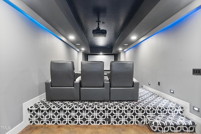 carpeted cinema room featuring baseboards and recessed lighting