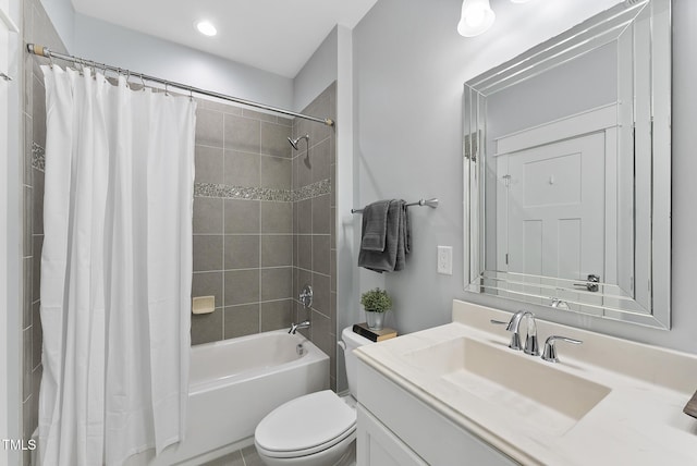bathroom featuring toilet, recessed lighting, shower / bathtub combination with curtain, and vanity