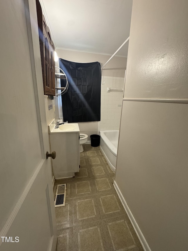 full bathroom featuring vanity, shower / bathtub combination, toilet, and visible vents