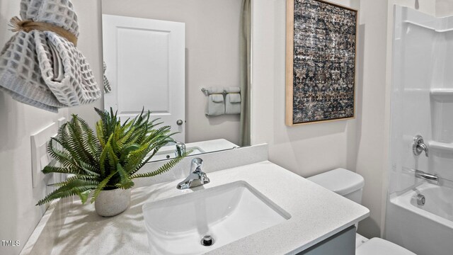 400 Apricot Ln, Carthage, NC 28327 - full bathroom with vanity, bathing tub / shower combination, and toilet