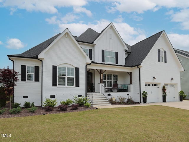 1180 Duke Farm Dr, Wake Forest, NC 27587 - view of front of property featuring a porch, an attached garage, board and batten siding, concrete driveway, and a front lawn