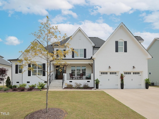 1180 Duke Farm Dr, Wake Forest, NC 27587 - traditional-style home with a garage, board and batten siding, covered porch, concrete driveway, and a front lawn