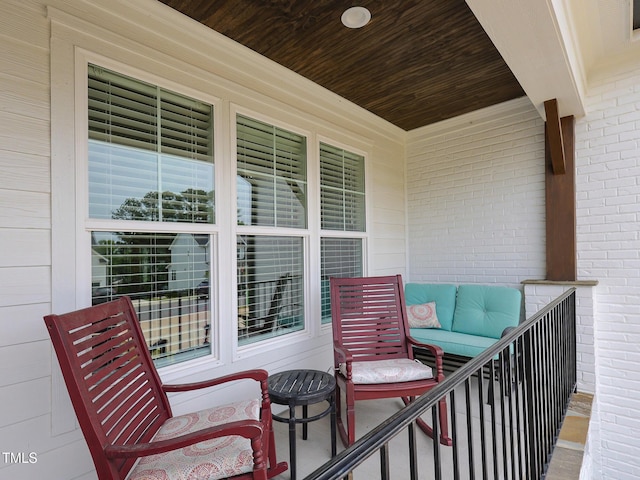 1180 Duke Farm Dr, Wake Forest, NC 27587 - balcony with covered porch and outdoor lounge area