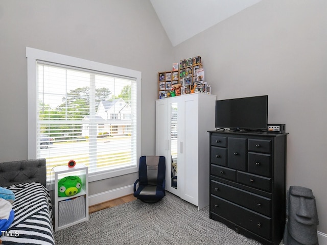 1180 Duke Farm Dr, Wake Forest, NC 27587 - sitting room with healthy amount of natural light, wood finished floors, baseboards, and high vaulted ceiling