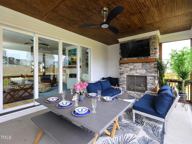 1180 Duke Farm Dr, Wake Forest, NC 27587 - view of patio / terrace featuring an outdoor living space with a fireplace and a ceiling fan