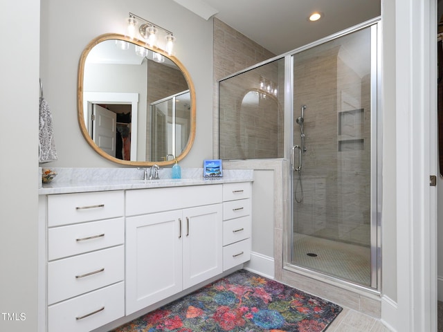 1180 Duke Farm Dr, Wake Forest, NC 27587 - bathroom with recessed lighting, a stall shower, and vanity