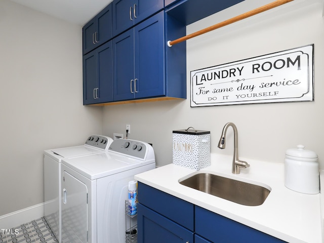 1180 Duke Farm Dr, Wake Forest, NC 27587 - clothes washing area with washing machine and clothes dryer, cabinet space, and baseboards