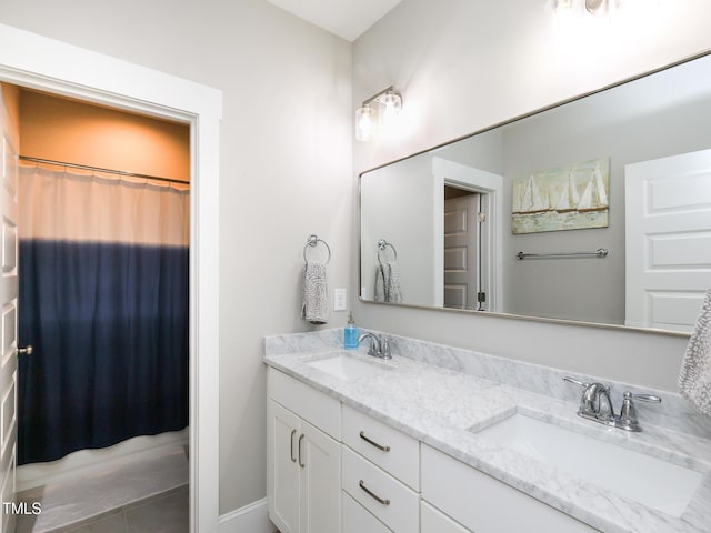 1180 Duke Farm Dr, Wake Forest, NC 27587 - full bathroom featuring double vanity and tile patterned floors